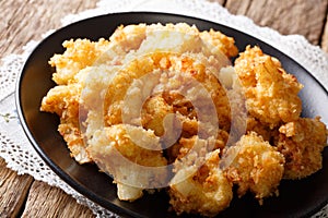 Delicious roasted cauliflower in breading close-up. horizontal