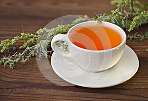 Delicious sagebrush tea in a beautiful glass bowl on table