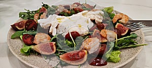Delicious salad of figs, shrimp and buratta cheese