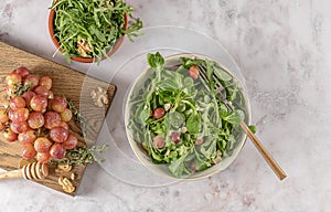 Delicious salad made from caramelized roasted grapes, peppery arugula, toasted walnuts, and pecorino cheese.