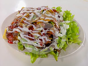 Delicious salad on table