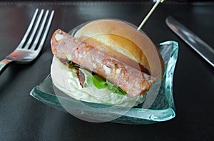 Delicious salami hamburgers on table food