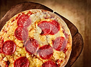 Delicious salami or pepperoni Italian pizza