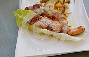 Delicious salmon roasted with potatoes and vegetables