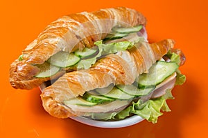 Delicious sandwich with ham and cheese