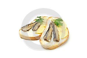 Delicious sandwiches with sprats isolated on white background