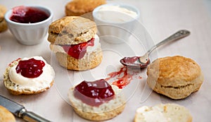 Delicious scones with clotted cream and strawberry jam