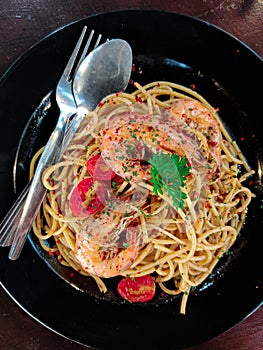 Delicious seafood Aglio Olio with big prawns.