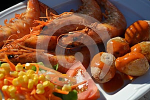 Delicious seafood with potatoes and mojo picon sauce photo