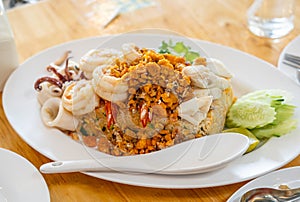 Delicious seafood thai fried rice (crab meat, shrimp, crab roe and squid