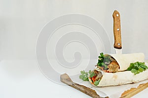 Delicious shawarma sandwich kebab on white background with space for text. fast food