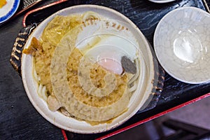 Delicious shrimp tempura udon with egg - Japanese food