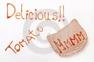 Delicious sign with ketchup and mmmm on the bread with pate