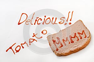 Delicious sign with ketchup and mmmm on the bread with pate