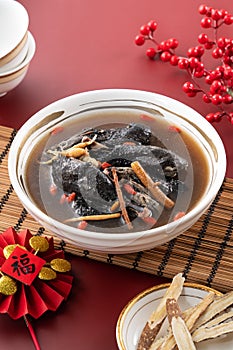 Delicious silky chicken soup with Chinese herbal medicine