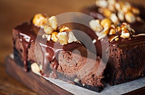 Delicious slice of chocolate cake sitting on a bakery table
