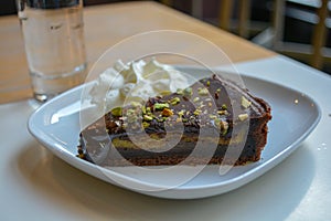 A delicious slice of dark chocolate and pistacchio cake