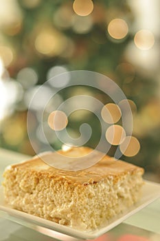 Delicious sliced cake with bokeh