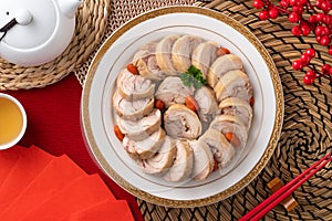 Delicious sliced chicken roll soaked in Chinese wine for lunar new year`s dishes