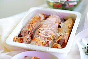 Delicious sliced chicken or turkey meat loaf served on a party or wedding reception