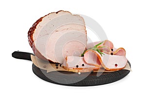 Delicious sliced ham with rosemary and peppercorns isolated on white