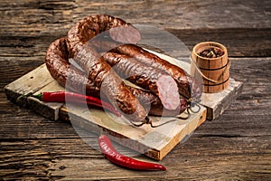 Delicious smoked sausages. Food recipe background. Close up