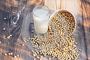 Delicious soy milk on wooden table background