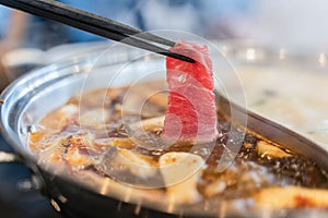 Delicious spicy beef shabu shabu in hot pot