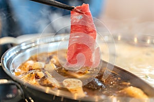Delicious spicy beef shabu shabu in hot pot