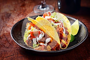 Delicious spicy tacos with meat and vegetables