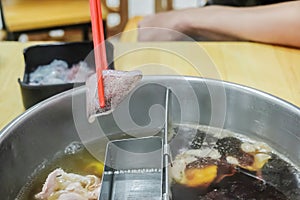 Delicious squid for shabu shabu in a hot pot