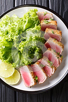 Delicious steak ahi tuna in bread crumbs panko with lettuce and