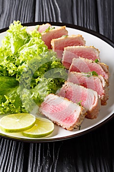 Delicious steak ahi tuna in bread crumbs panko with lettuce and