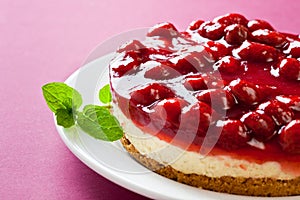 Delicious strawberry cheese cake with fresh mint