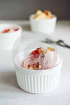 Delicious Strawberry Ice Cream with fresh strawberries and cookies in a bowl