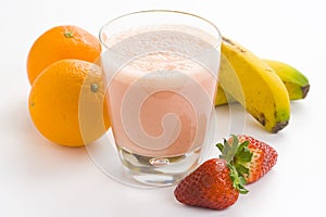 Delicious strawberry orange banana milkshake