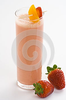 Delicious strawberry orange banana milkshake