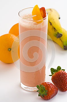 Delicious strawberry orange banana milkshake