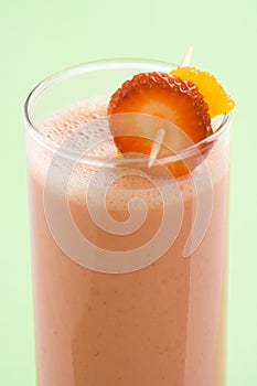 Delicious strawberry orange banana milkshake