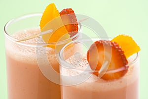 Delicious strawberry orange banana milkshake