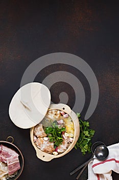 Delicious Stuffed Cabbage Leaves In Clayware Pot photo