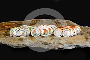 Delicious Sushi Roll on a stone Plate