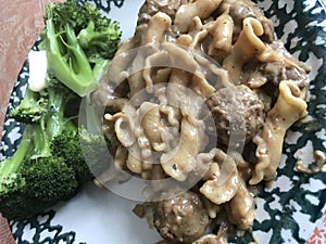 Delicious Swedish Meatballs and Pasta Meal Accompanied with Fresh Broccoli