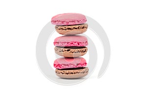 Delicious and sweet chocolate and raspberry flavor macaron or macaroon, special famous dessert isolated