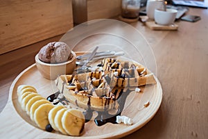 Delicious sweet dessert : homemade waffle with chocolate sauce