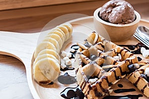 Delicious sweet dessert : homemade waffle with chocolate sauce