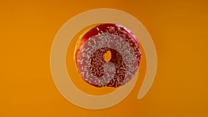 Delicious sweet donut rotating