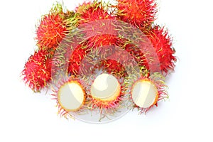 The delicious sweet fresh rambutan tropical fruit and three rambutans peel