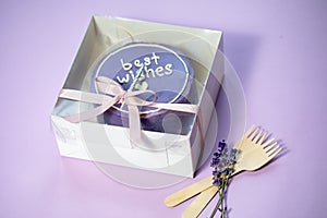 Delicious sweet marshmallow zephyr in boxes on a paper colored background, the boxes are tied with a ribbon with a bow