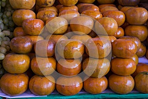 Delicious tangerines on the rustic table on a market in Arequipa, Peru
